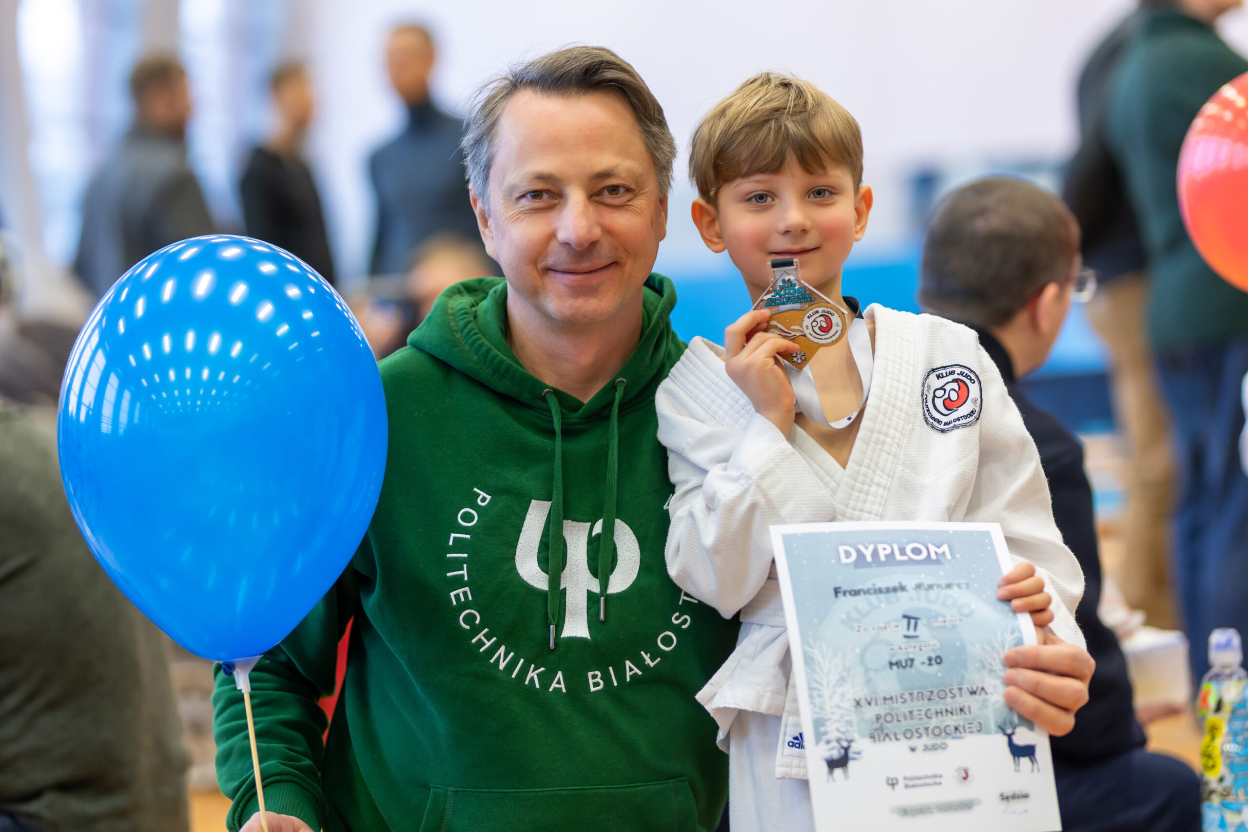 Zawodnik z rodzicem - zawody o Puchar Klubu Judo Politechniki Białostockiej.